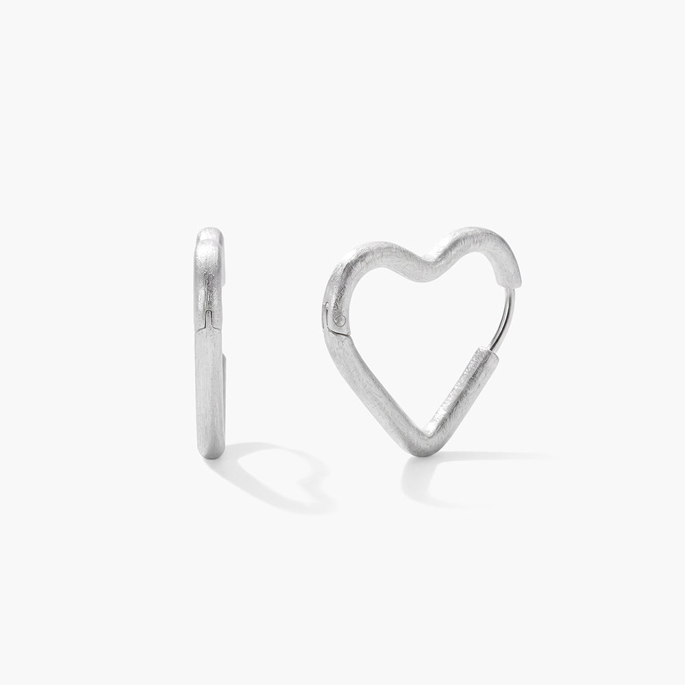 Sweet Silver Sculpted Heart Hoop Earrings